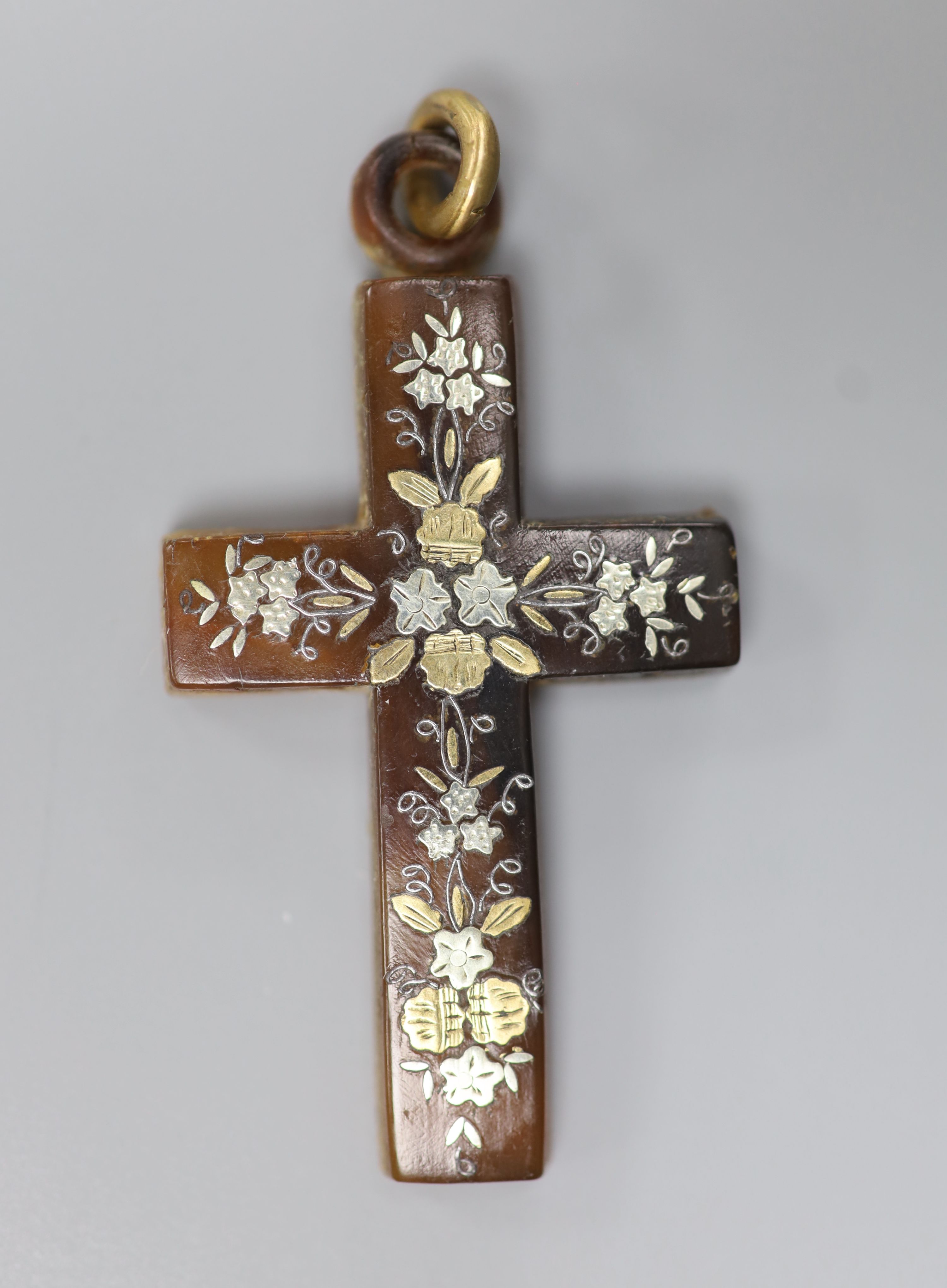 Two late 19th/early 20th century tortoiseshell and pique cross pendants